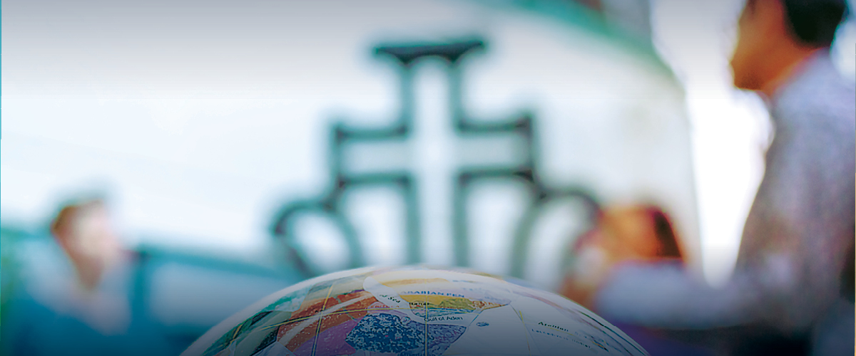 globe and cross banner